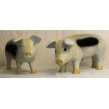 A pair of ornamental garden pigs 28Hx62L