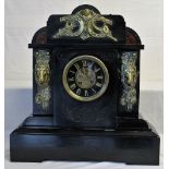 A Victorian slate clock, with brass mounts depicting horses & jockeys. . Possibly a presentation