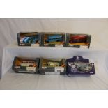 A box of 6 boxed Corgi coaches and lorries