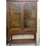A mahogany inlaid display cabinet with 2 drawer and lower shelf standing on pad feet 190 x 120 x 40