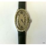 Ladies Oval Platinum And Diamond Wristwatch