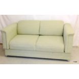 An upholstered sofa bed/2 seat settee