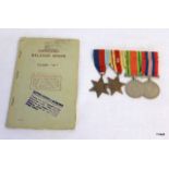 A WW2 medal group of four including Africa Star with his Officers Release Book and other documents