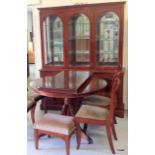A mahogany display cabinet and round extending table and 4 chairs