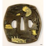 A Japanese bronze tsuba