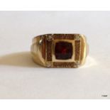 A 9ct gold mans Diamond and garnet ring size W