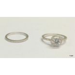 A silver and cz dress ring and matching half eternity ring size P