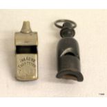 Two old railway whistles one stamped GER for the Great Eastern Railway with the other stamped L&