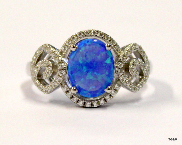 A silver cz and opalite set ring