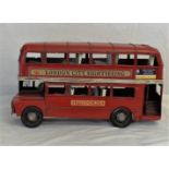 A tin plate model of a London bus