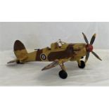 A tin plate model of a Spitfire plane