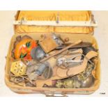 A vintage French suitcase containing a large amount of vintage wooden ware, metal ware, tools,