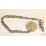 A white metal Beaufort Whistle with Lion mask boss and triple chains