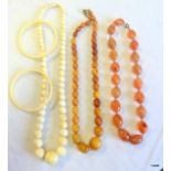 Ivory and amber bead bracelets