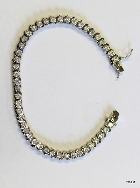 A silver and cz line bracelet