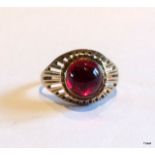 A 9ct gold ruby cabochon mans signet ring size q