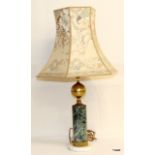 A marble and brass table lamp 78cm