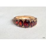 A 9ct gold antique style garnet ring size N