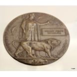 A WW1 Memorial Plaque or Death Penny named to George Henry Yermouth - this has a spelling mistake as