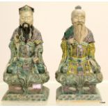 A pair of Chinese temple figures, measuring 25cm tall.
 
there is a chip to one figures hat (see