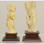 A pair of carved ivory Indian dancers 17cm tall