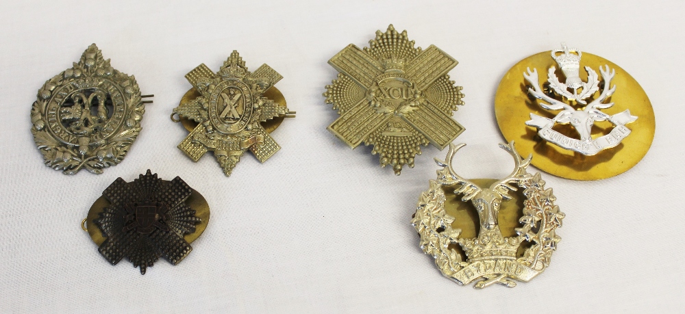 Six Scottish regimental cap badges