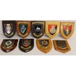 Nine military badges mounted on wooden shields to the Near East Land Forces - Royal Scots - Sherwood