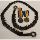 A WW1 medal pair named to 276620 Private GN Brown of the Labour Corps and his 1918 dated coil saw