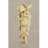 C19th Japanese carved ivory netsuke of old man with walking stick and sack to shoulders. 68mm