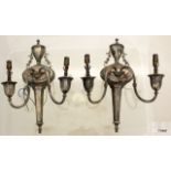 Pair of silvered two branch wall lights with urn and swag decoration