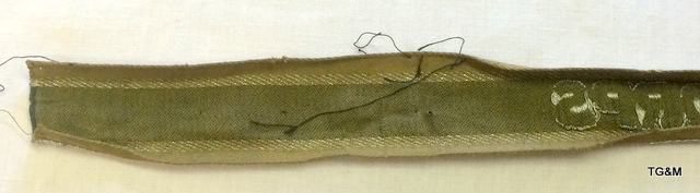 A WW2 South African Afrikakorps sleeve title. Measures 16" long. - Image 5 of 7