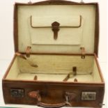 A small leather suitcase  50 x 33cm
