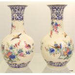 2 Continental Bulbous vases 41cm high
We are not able to determine the age of the pieces but the