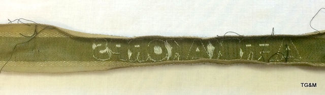 A WW2 South African Afrikakorps sleeve title. Measures 16" long. - Image 6 of 7