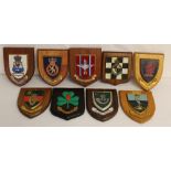 Nine military badges mounted on wooden shields to the No5 Field Force - Corps of Signals - Light