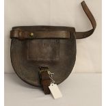 A Boer War horseshoe carrier with integral frog for sword or bayonet. Stamped to the nail pouch