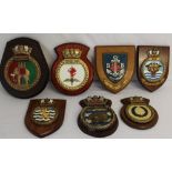Seven hand painted Naval ships crests mounted on wooden shields to HMS Triumph - HMS Ashanti - HMS