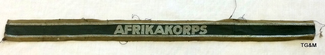 A WW2 South African Afrikakorps sleeve title. Measures 16" long.