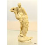 C19th Japanese tall ivory okimono figure of boy riding on back of bird 19cm high
condition
feather