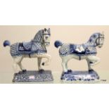 A pair of blue and white horses, possibly Delft. Measuring 24 x 20cm
 
Condition report
There