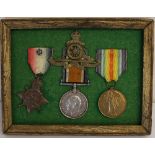 A WW1 Mons Star medal trio named to 40686 Gunner AW Godfrey of the Royal Artillery with his cap