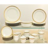 A part dinner service by Harrods The Apsley range with 22ct gold trim