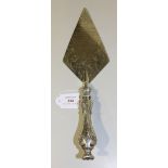 A Victorian silver presentation trowel, the foliate scroll engraved blade inscribed 'Presented to