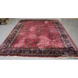 A Sparta carpet, South-west Anatolia, mid-20th Century, the plum field with overall floral sprays,