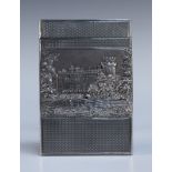 An early Victorian silver castle-top card case of rectangular form with hinge lid, one side die-