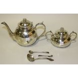A Peruvian .925 silver teapot of globular form and a matching two handled sugar bowl and cover,