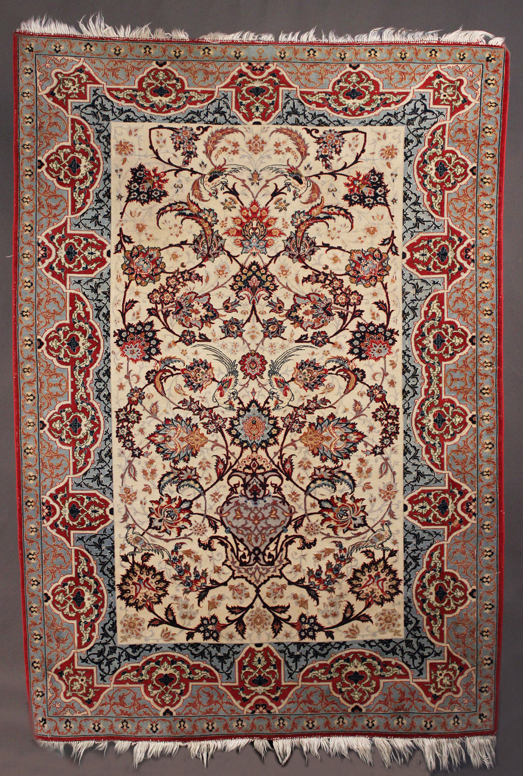 An Esfahan Seirafian type rug, Central Persia, early 20th Century, the ivory field with ascending