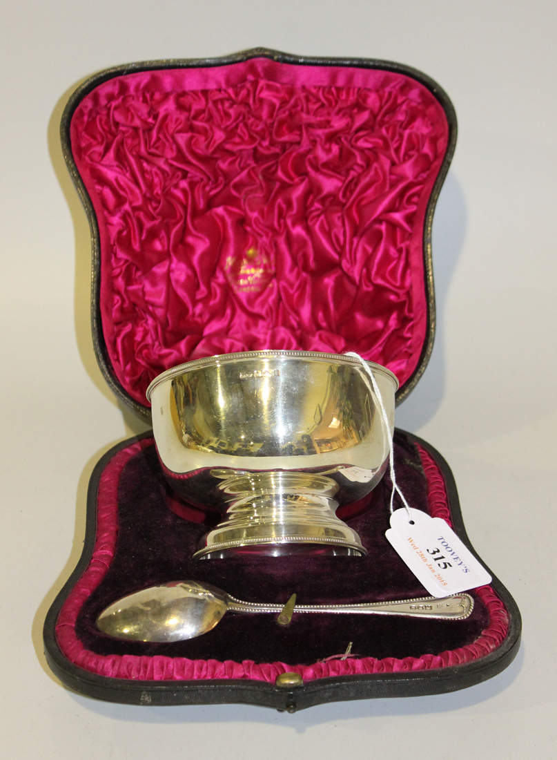An Edwardian silver footed christening bowl with beaded rim and foot, Sheffield 1901 by Mappin &