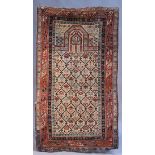 A Daghestan prayer rug, North-east Caucasus, late 19th Century, the ivory mihrab with an overall