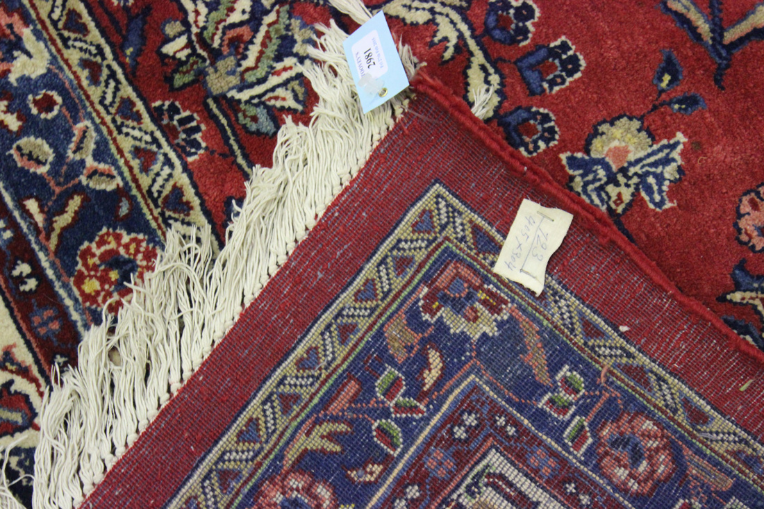 A Sarough carpet, Central Persia, mid/late 20th Century, the red field with overall flower sprays - Image 2 of 3